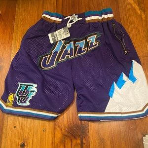 Mens Utah Jazz shorts never worn . Too big for my son . Size small